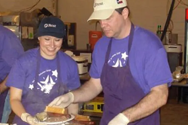 Frost Insurance — employees serving food
