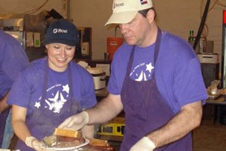 Frost Insurance — employees serving food