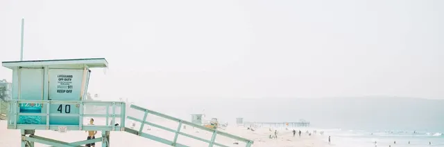 Beach Break Insurance Agency — lifeguard tower on a San Diego beach