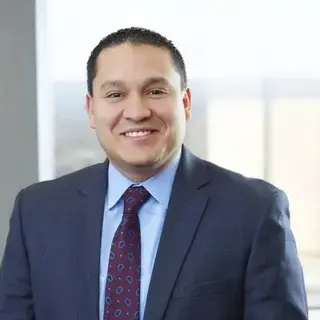 Carlos Torrez at Poms & Associates
