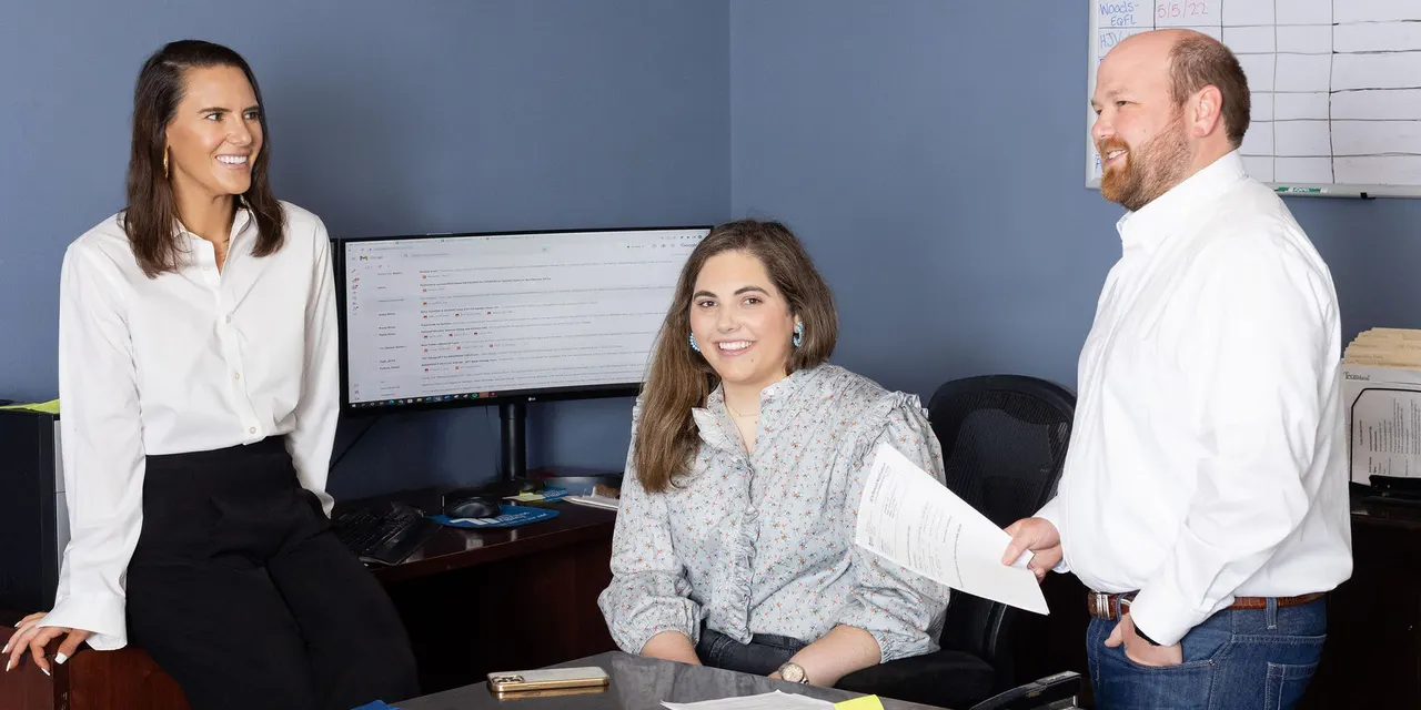 Time Insurance Agency team at the office
