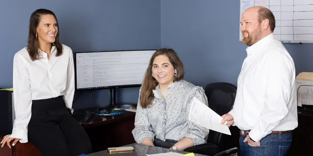 Time Insurance Agency team at the office
